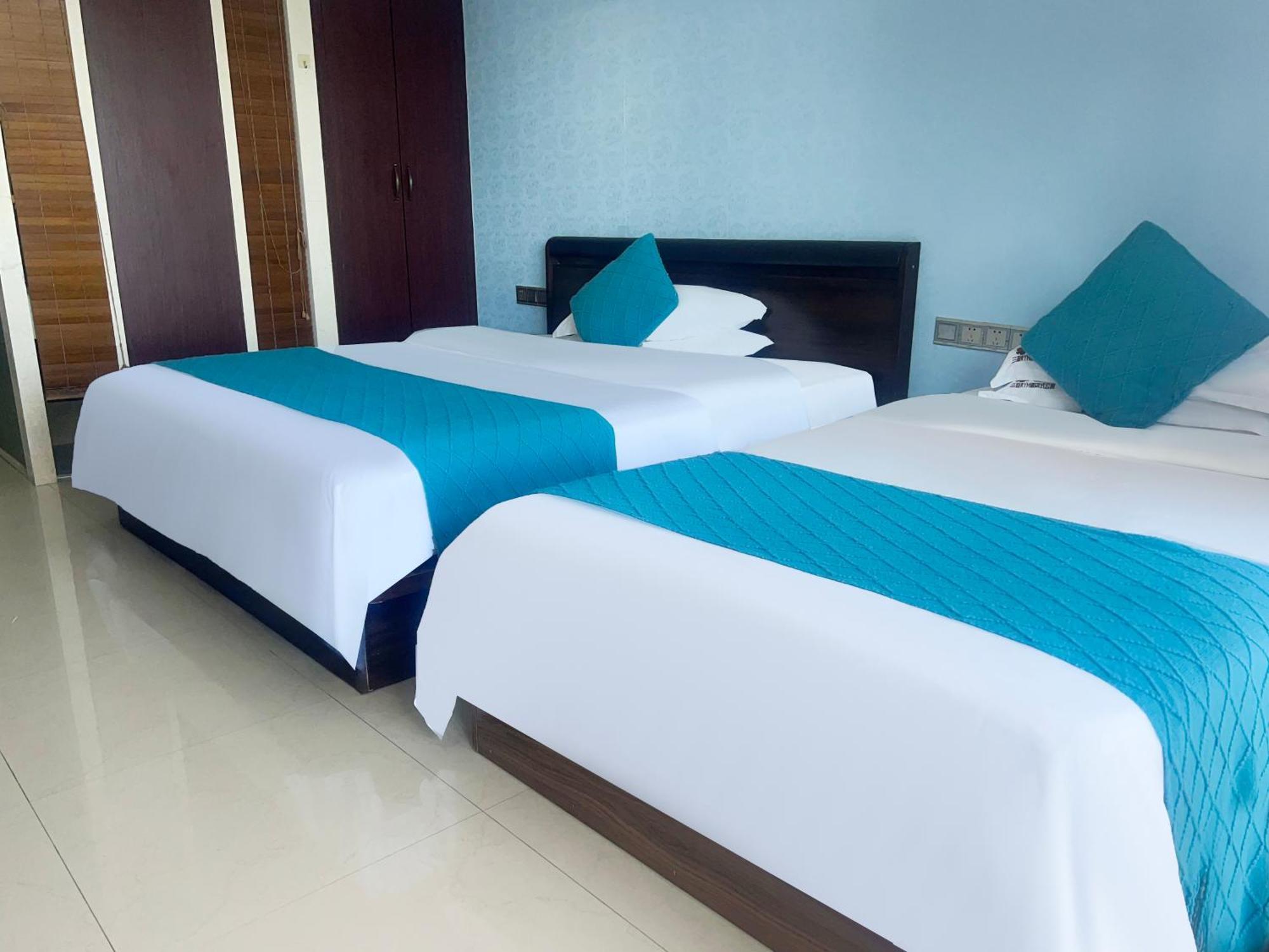 Sanya Sun And Sea Gueshouse Aparthotel Buitenkant foto